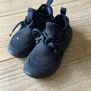 Nike kids shoes. Black on black.